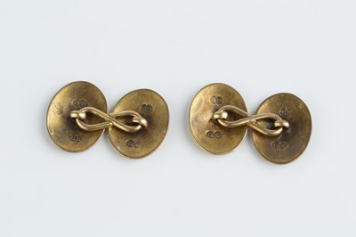 Lot 44 - A pair of cufflinks, each oval panel with...