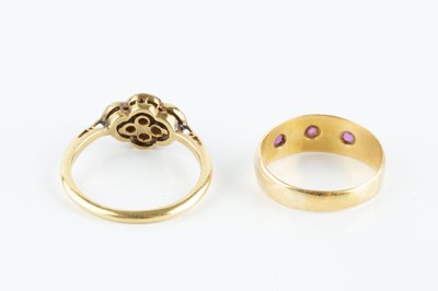 Lot 63 - A diamond four stone ring, designed as an...