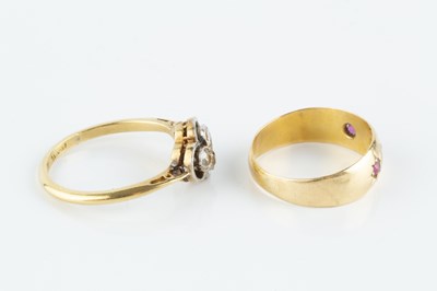 Lot 63 - A diamond four stone ring, designed as an...