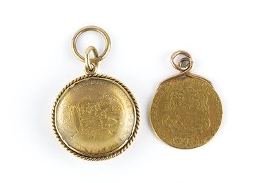 Lot 244 - A George III guinea pendant, dated 1774, with...