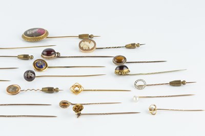 Lot 58 - A collection of antique and later stick pins,...