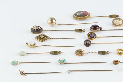 Lot 58 - A collection of antique and later stick pins,...