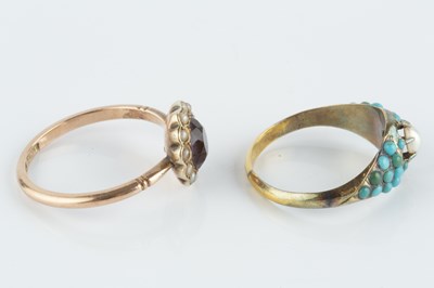 Lot 33 - Two gem set dress rings, comprising an...