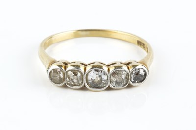 Lot 95 - A diamond five stone ring, the graduated...