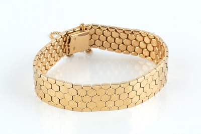 Lot 2 - A yellow precious metal fancy-link bracelet,...