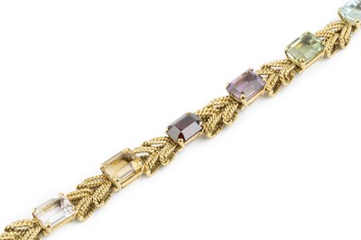 Lot 175 - A vari gem-set bracelet, of herringbone-link...