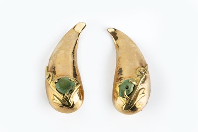 Lot 77 - A pair of ear clips, each teardrop-shaped...