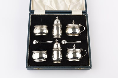 Lot 473 - A silver six piece cruet set, each piece with...