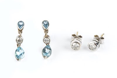 Lot 94 - A pair of diamond ear studs, each round...