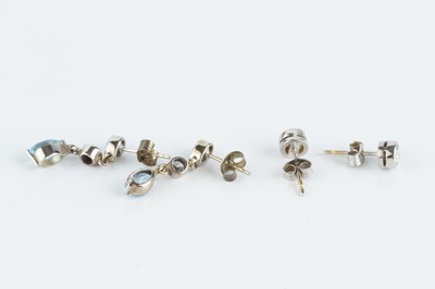 Lot 94 - A pair of diamond ear studs, each round...