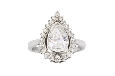 Lot 181 - A diamond cluster ring, the pear-shaped old...