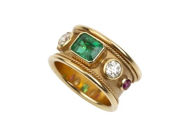 Lot 171 - An emerald, ruby and diamond dress ring, the...