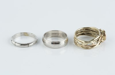 Lot 110 - Two 9ct white gold wedding bands, the first...