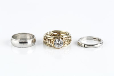 Lot 110 - Two 9ct white gold wedding bands, the first...