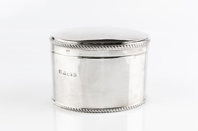 Lot 491 - A silver oval biscuit box, with hinged top and...