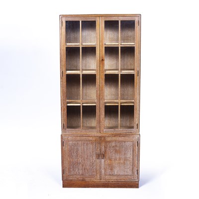 Lot 8 - Heals limed oak bookcase,1930s, with key and...