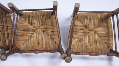 Lot 15 - Heals set of four dining chairs, with raffia...