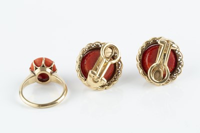 Lot 85 - A pair of coral ear clips, each coral...