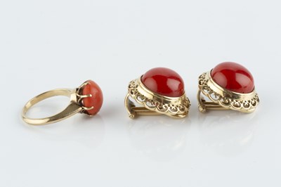 Lot 85 - A pair of coral ear clips, each coral...
