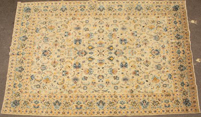 Lot 297 - A light green ground Oriental rug with...