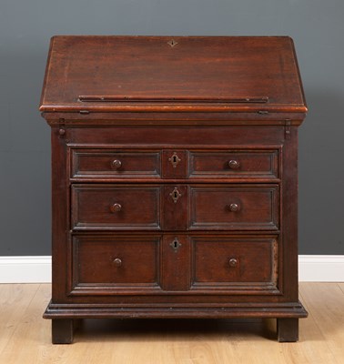 Lot 298 - A William and Mary oak bureau, the fall front...