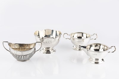 Lot 499 - An Edwardian silver sugar bowl, with shaped...