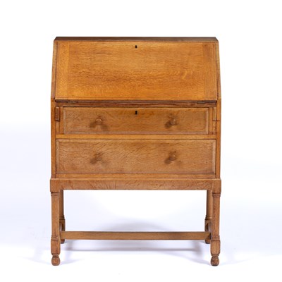 Lot 3 - Heals limed oak bureau, a Heals button to the...