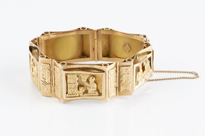 Lot 118 - A yellow precious metal panel bracelet, the...