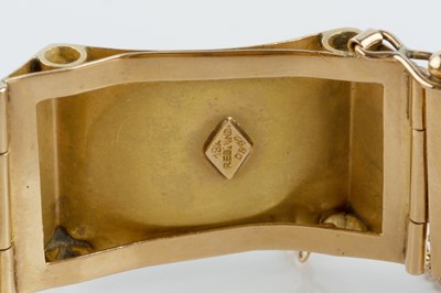 Lot 118 - A yellow precious metal panel bracelet, the...