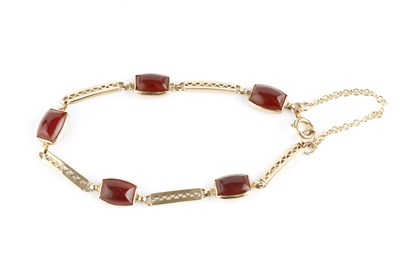 Lot 40 - A carnelian panel bracelet, designed as a...