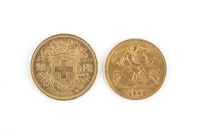 Lot 240 - A Swiss 20 Franc coin, dated 1907, and a...