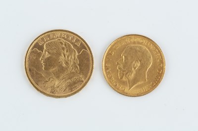 Lot 240 - A Swiss 20 Franc coin, dated 1907, and a...