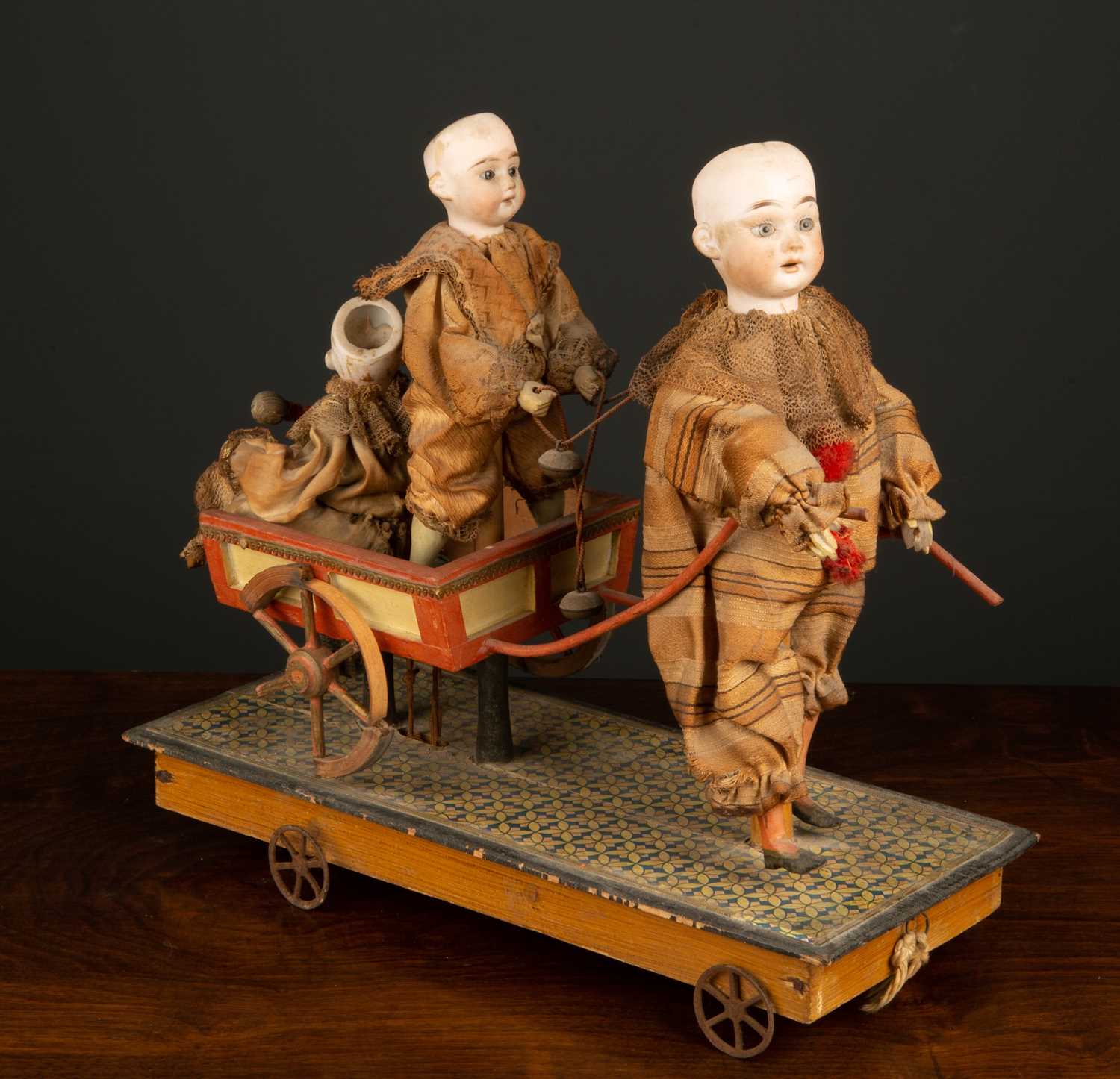 Lot 263 - A Victorian pull along toy formed as three