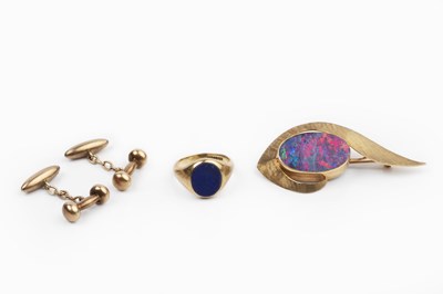 Lot 96 - An opal doublet panel brooch, the undulating...