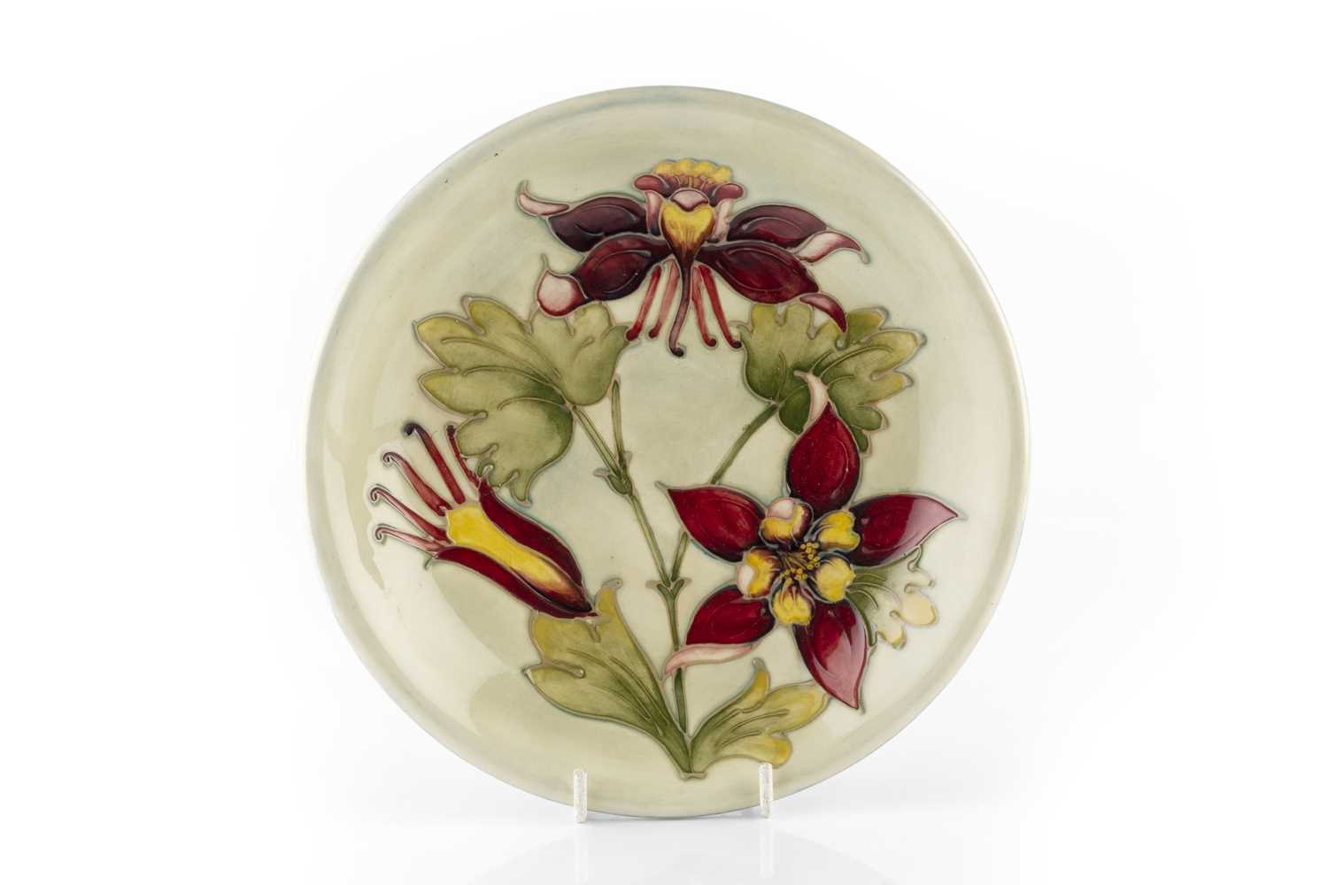 Lot 689 - Walter Moorcroft Red Columbine pattern dish...