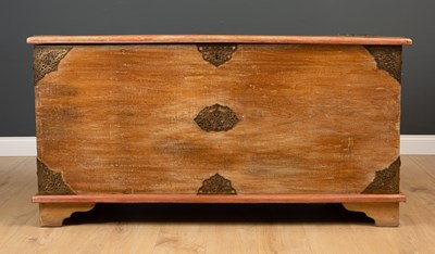 Lot 193 - An Oriental large elm chest with pierced brass...