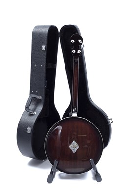Lot 233 - An Aria banjo, the body with ivorine banded...