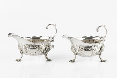 Lot 605 - A pair of George II silver sauce boats,...