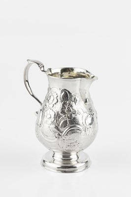 Lot 609 - A George II silver baluster cream jug,...