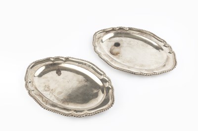 Lot 372 - A pair of George II silver oval platters, with...