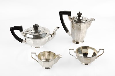 Lot 613 - A silver four piece tea service, of octagonal...