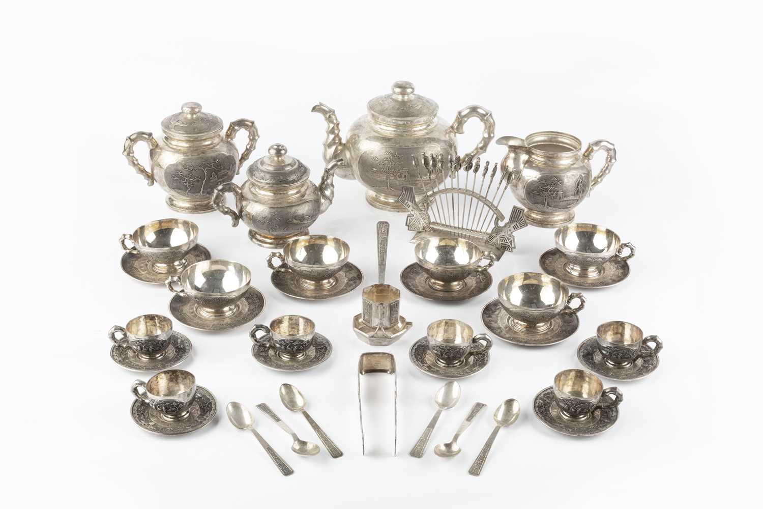 Lot 347 - An extensive Vietnamese silver tea service,...