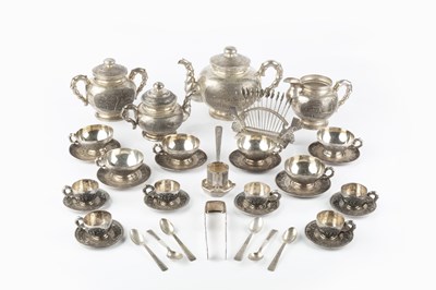 Lot 347 - An extensive Vietnamese silver tea service,...