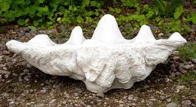 Lot 811 - A large cast composite clam shell 67cm wide x...