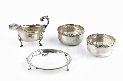 Lot 367 - A silver waiter, with beaded and shaped border,...