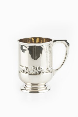 Lot 389 - A silver christening mug, the slightly...