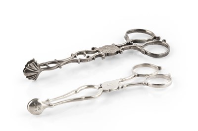 Lot 306 - A pair of George III silver sugar tongs, of...