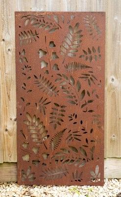 Lot 820 - A pierced steel panel decorated with fern...