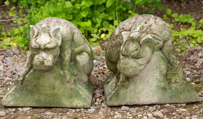 Lot 827 - A pair of cast reconstituted stone Gothic...