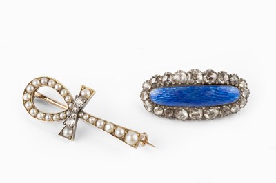 Lot 24 - Two diamond set brooches, comprising an ankh...